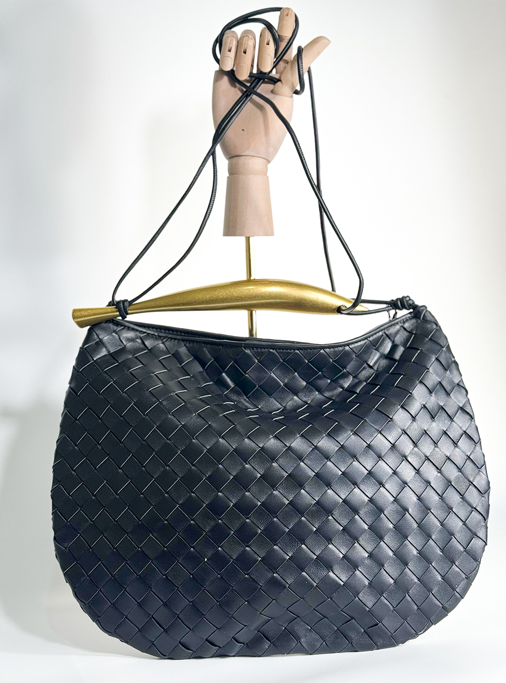 Luxurious black handbag made from natural leather