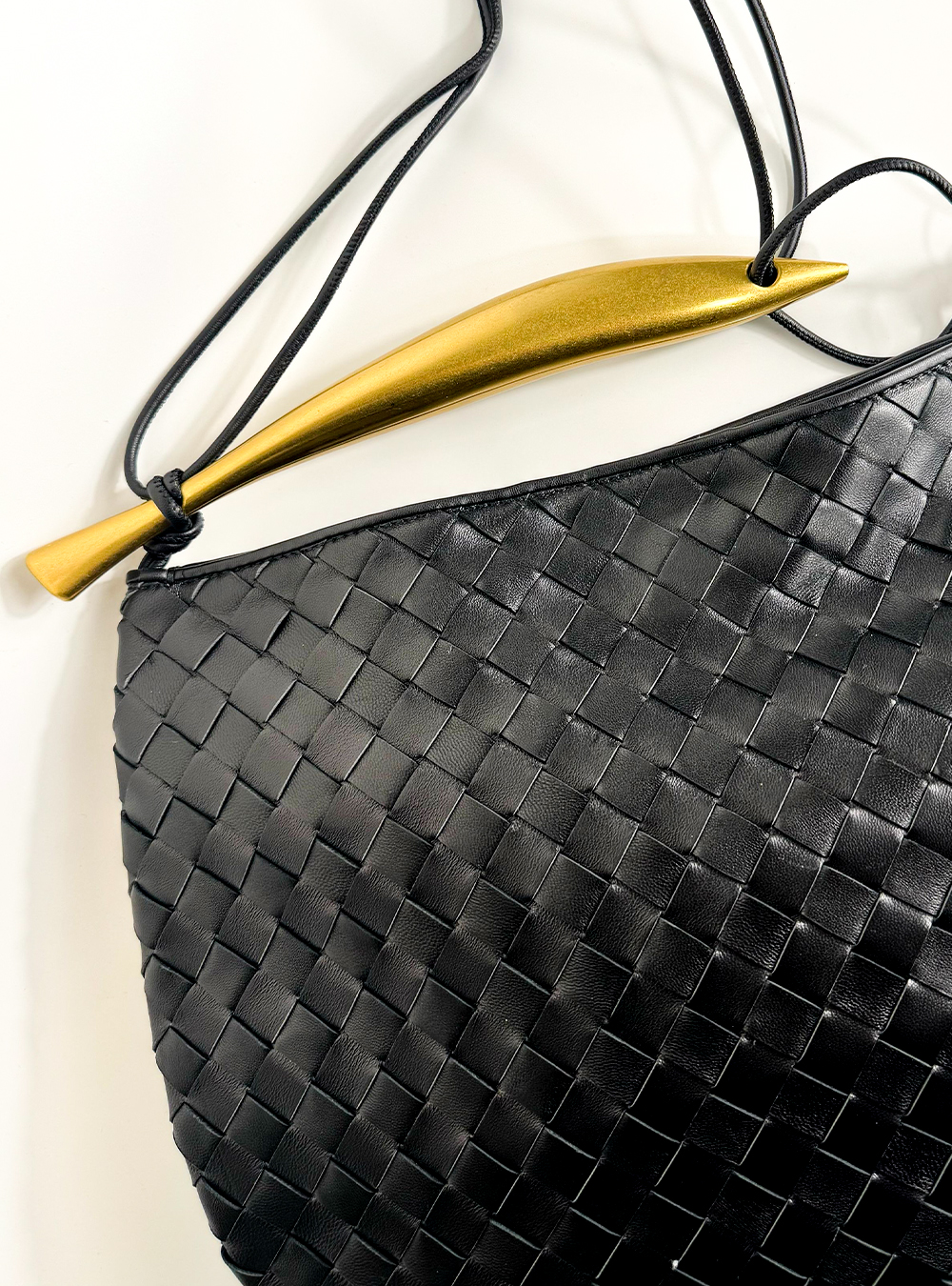Luxurious black handbag made from natural leather