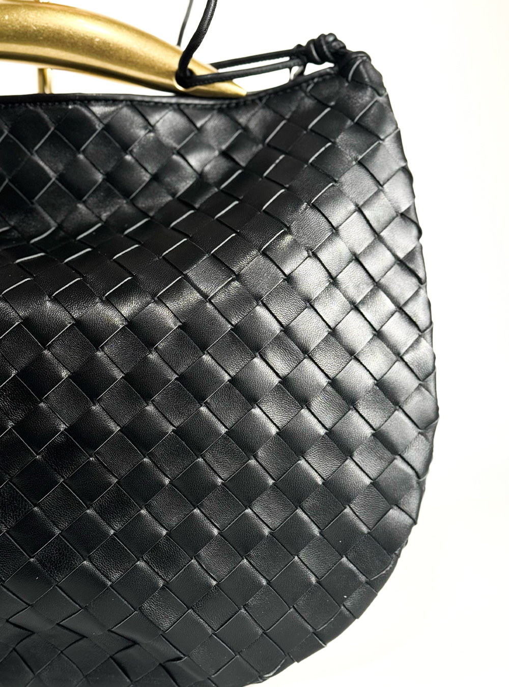 Luxurious black handbag made from natural leather